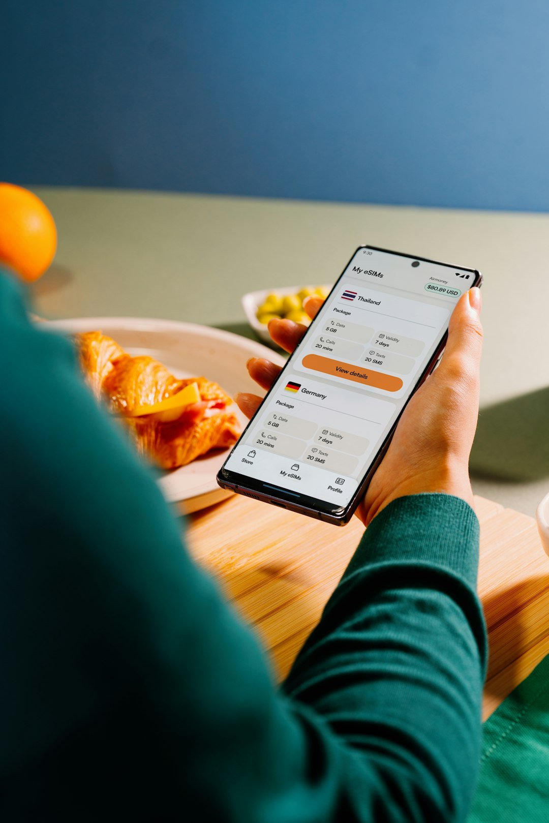 Person Using Phone With Currency Exchange Rates Ckl67k Boj0